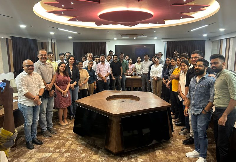 Founder cohort gathered in a boardroom