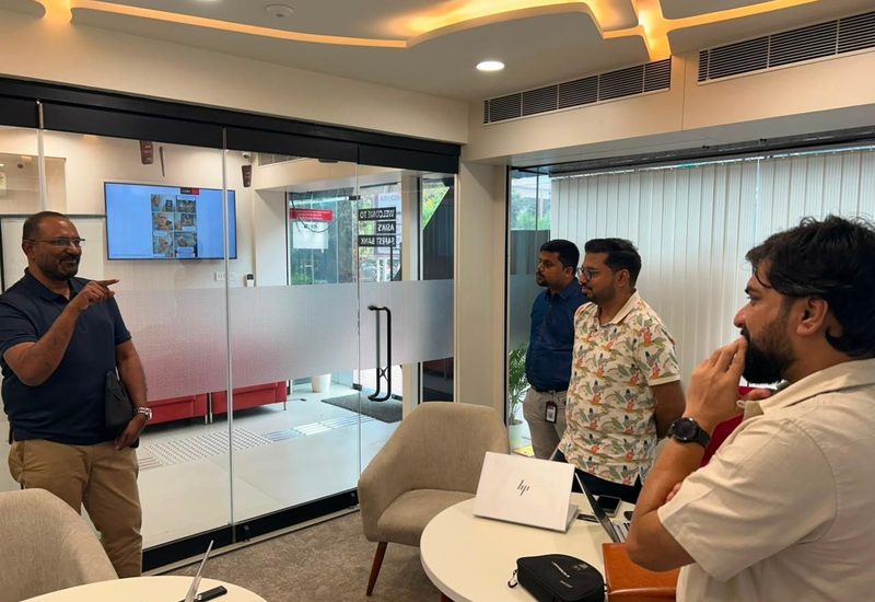 Founder pitch review session at a partner office